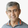 a headshot of ServiceNow president, chief product officer, and chief operating officer Amit Zavery