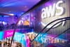 A picture of the AWS logo over an escalator in the Venetian Convention Center, site of re:Invent 2024.