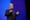 Amazon chief security officer Steve Schmidt speaks on stage wearning a dark suit.