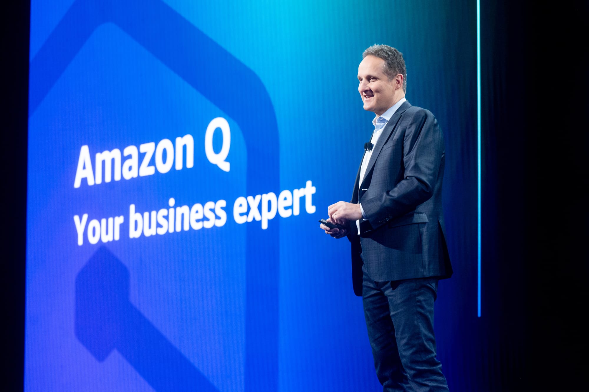 AWS CEO Adam Selipsky on stage at re:Invent 2023 introducing Amazon Q.